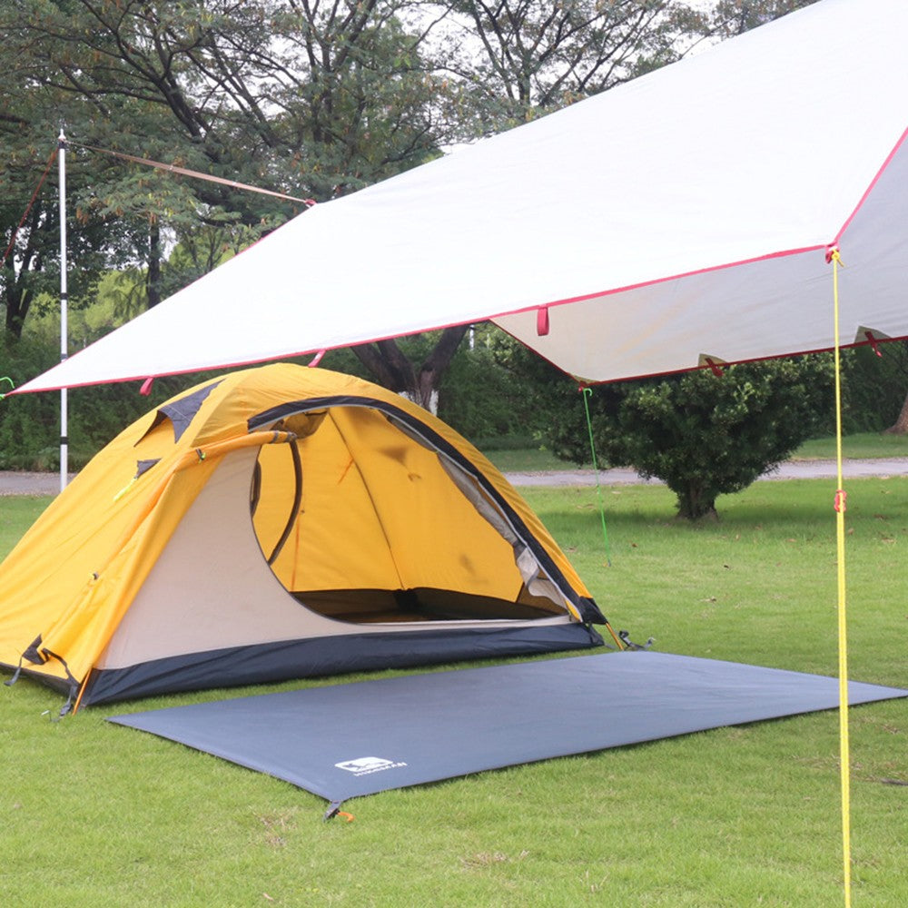 TrailShield – Lona Impermeável Multifuncional para Camping e Praia